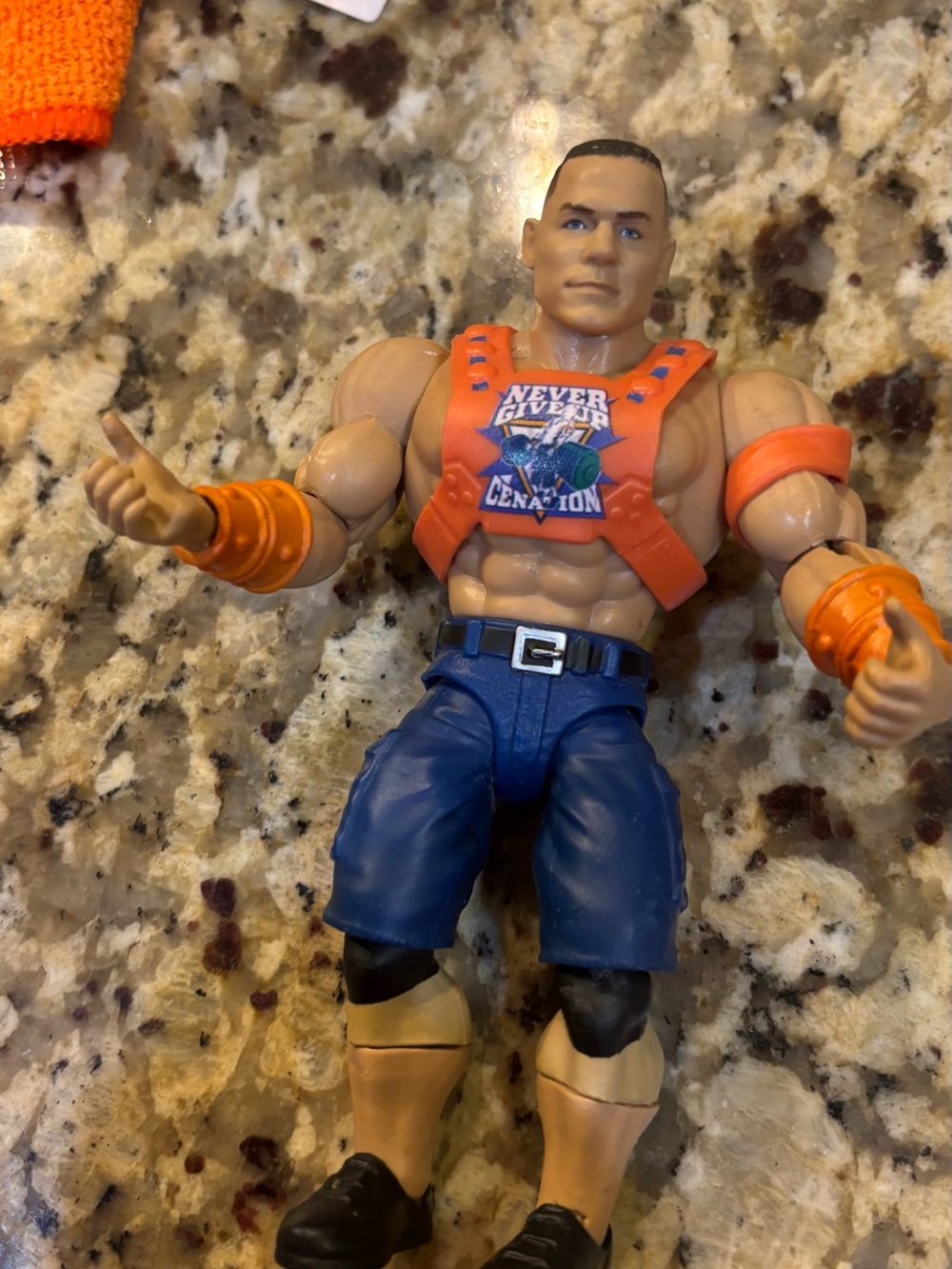 WWE John Cena Action Figure in Orange Vest and Blue Shorts